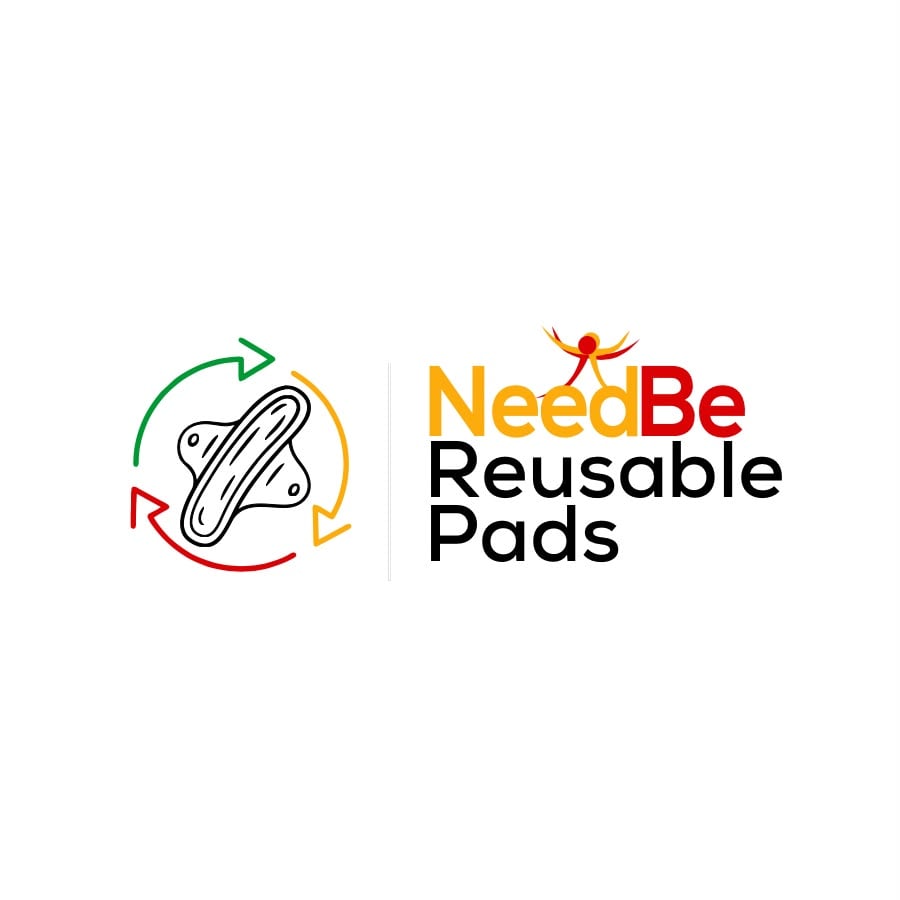 Smiling girls holding Obaa Reusable Pads kits